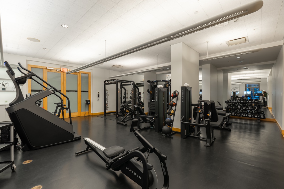 Fitness room with cardio and weight machines