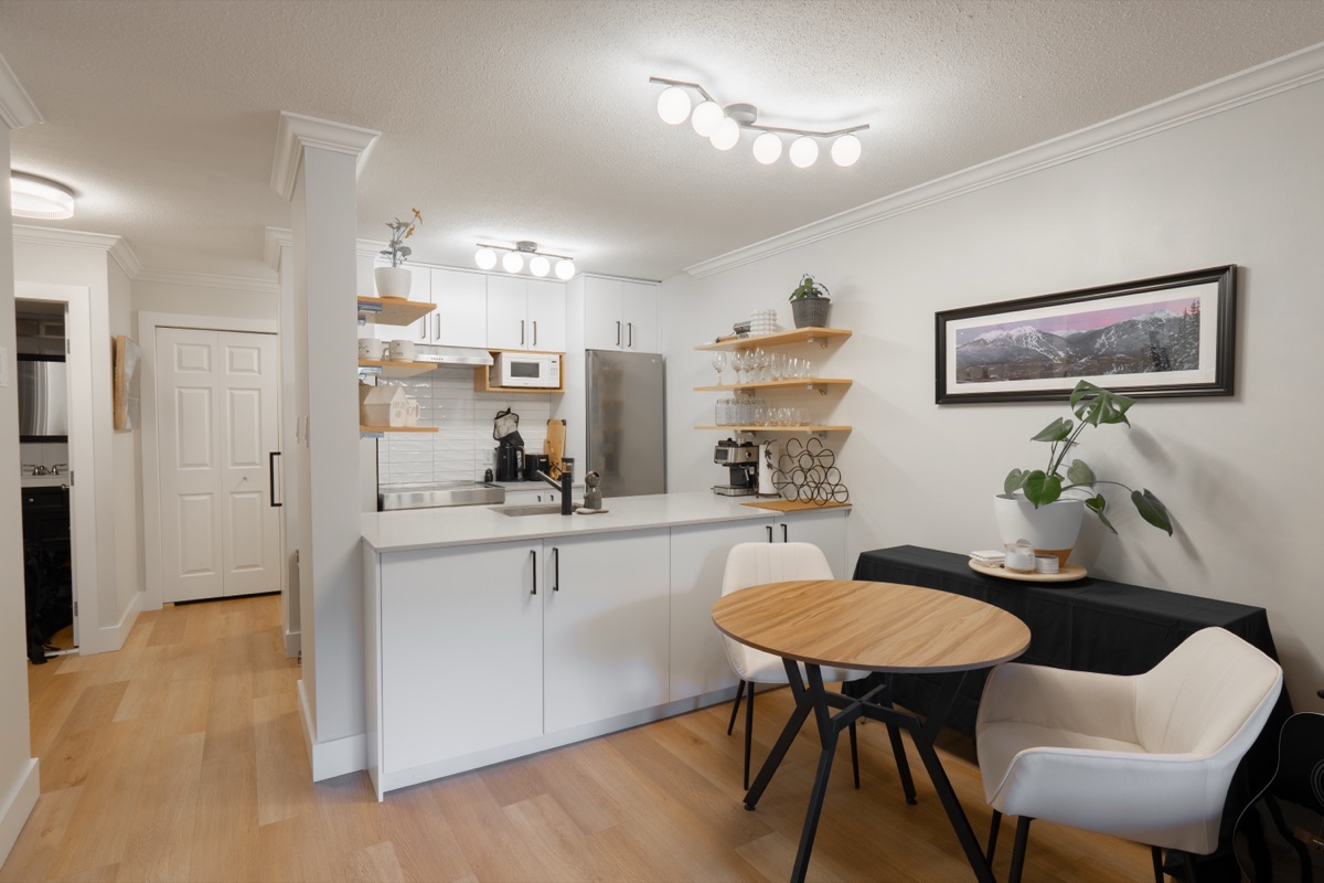 Bright condo with open living, dining and kitchen area